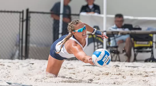 Lauren Galinis dives after the ball.