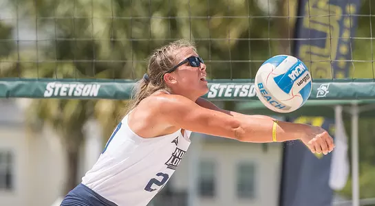 Kirby Smith looks to dig the ball.