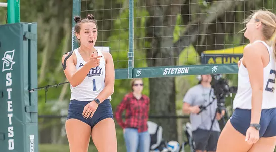 Callie Workman and Dana Roskic celebrate a point.