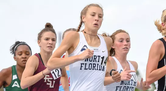 A group of Osprey 1500m runners compete on the track