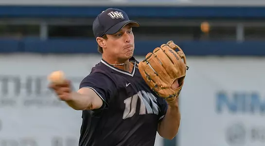 Baseball player Chris Berry throwing