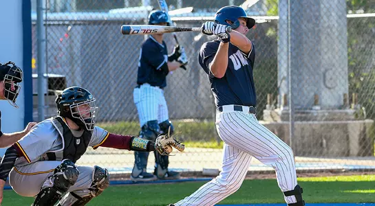 baseball player Chris Berry swinging the bat