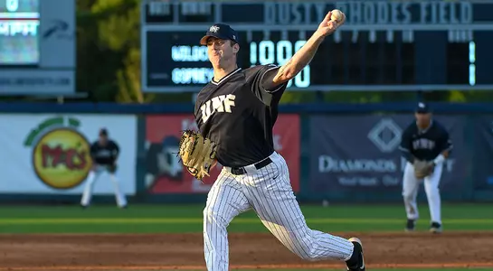 baseball player Hunter Bowling mid-pitch