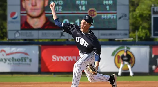 baseball player Logan Clayton pitching mid release