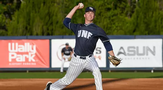 baseball player Logan Clayton mid pitch