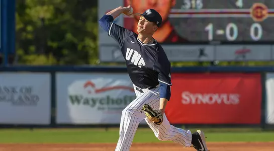 baseball player Logan Clayton mid pitch