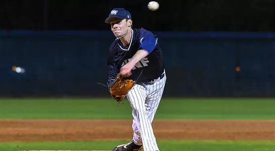 baseball player Eddie Miller pitching after release