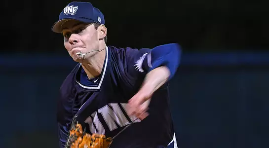 baseball player Eddie Miller pitching after release