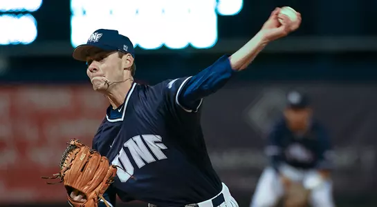 baseball player Eddie Miller mid pitch