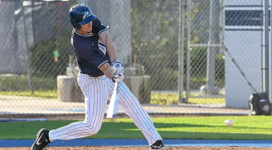baseball player Tanner Murphey mid swing
