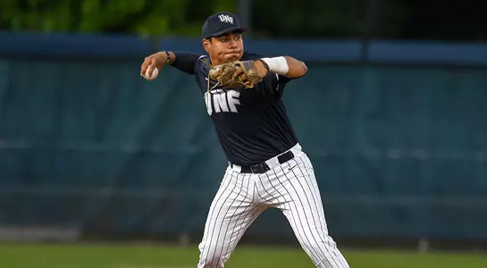 baseball player Abraham Sequera throwing baseball from short stop