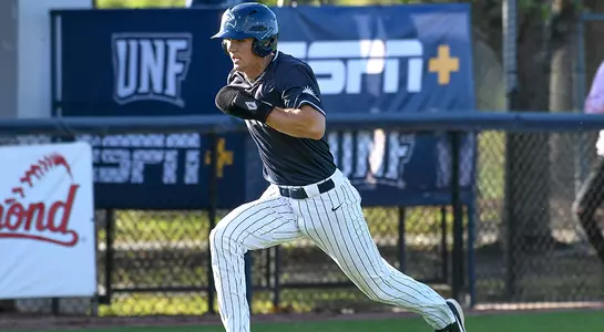 baseball player Wes Weeks running home from third base