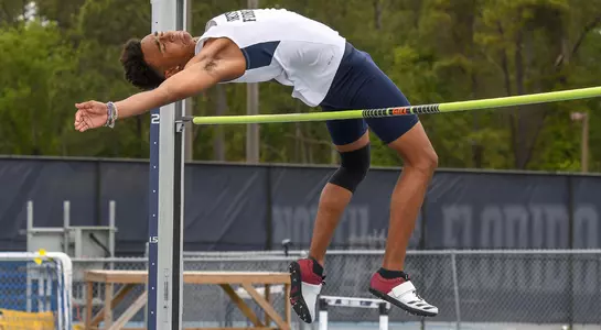 Jaasiel Torres leaps over the high jump bar