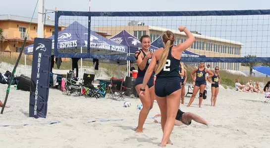 Dana Roskic and Callie Workman celebrate a point during a match at Jacksonville Beach.
