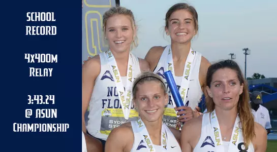 The Ospreys 4 by 400 meter women's relay team stands on podium after finishing third and setting a new school record