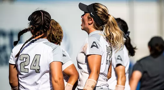 UNF softball celebrates after winning against FGCU.
