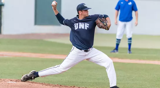 Picture of Nick Marchese following through on a pitch.