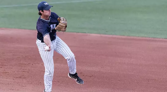 Photo of Chris Berry preparing to throw the ball.