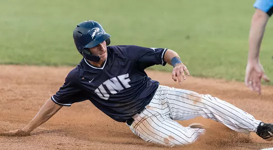 Photo of Chris Berry sliding.