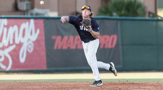 Photo of Tanner May throwing the ball