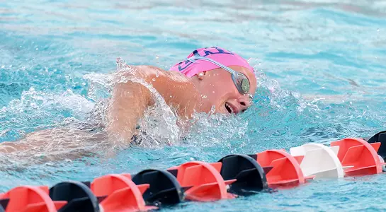 Action shot of Camryn Greenleaf swimming