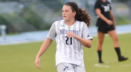 Kendra Hoffman waits for the soccer ball in the middle of the field