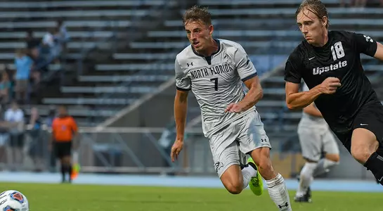 Jake Hawker makes a move against an Upstate defender.