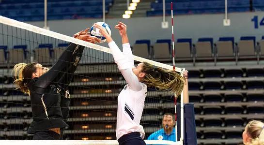 Julianna defends the net