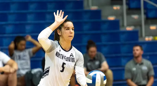 Julianna sets up for a serve