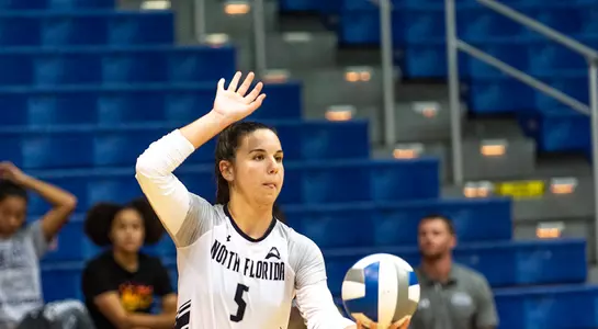Julianna sets up for a serve