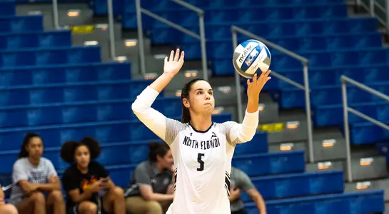 Julianna sets up for a serve