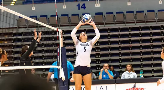 Julianna sets a ball up for a kill