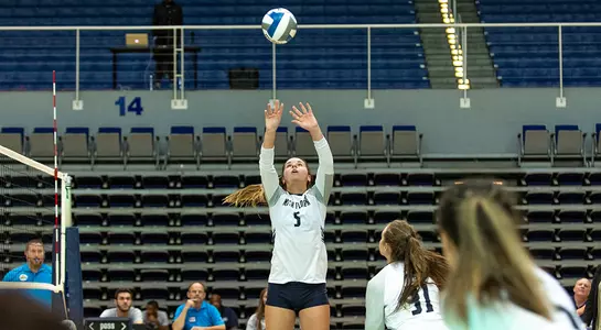 Julianna sets a ball up for a kill