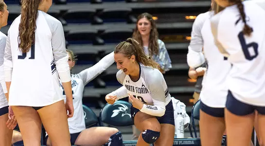 Alessia is welcomed on to the court by her teammates