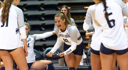 Alessia is welcomed on to the court by her teammates