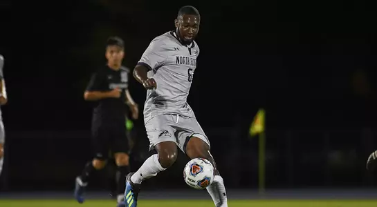 Torian Went attacks the soccer ball against USC Upstate