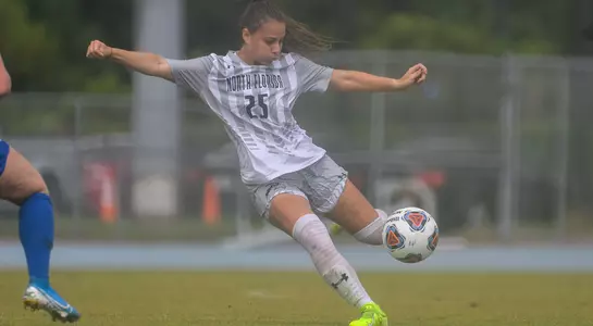 Carmel Oliveira volleys the ball in the air with her left foot