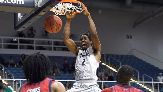 Wajid Aminu dunks the ball against NJIT at UNF Arena.