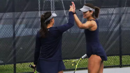 Lucia Montano and Ana Paul Melilo high five