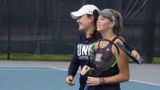 Constanza Gorches and Kendall Nash hug after a win