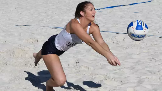 Carolyn Cain goes for a dig.