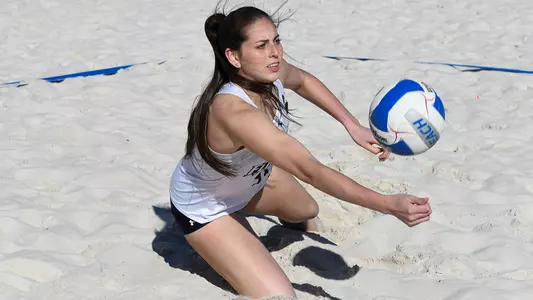 Solimar Cestero digs out the ball.