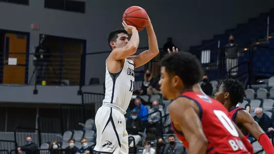 Jose Placer shoots a three-pointer
