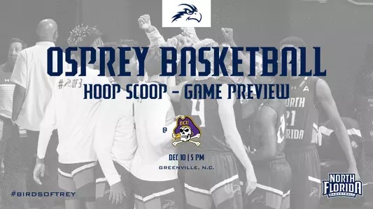 Hoop Scoop - Game preview for Men's Basketball at East Carolina in Greenville, North Carolina on Dec. 10 at 5 p.m. featuring blue lettering on gray background photo of team huddle on the floor