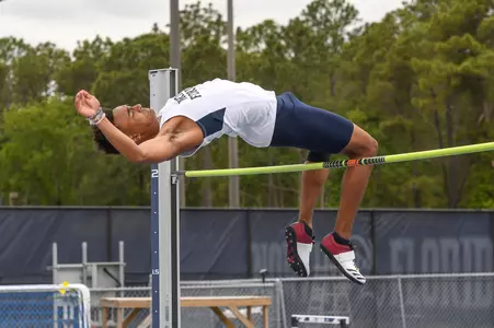 Jaasiel Torres crossing over the bar in the high jump
