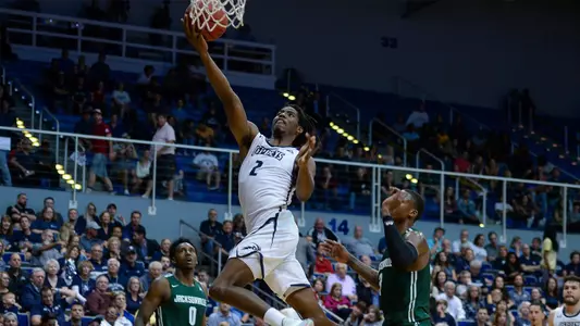 Wajid Aminu makes a layup past a defender