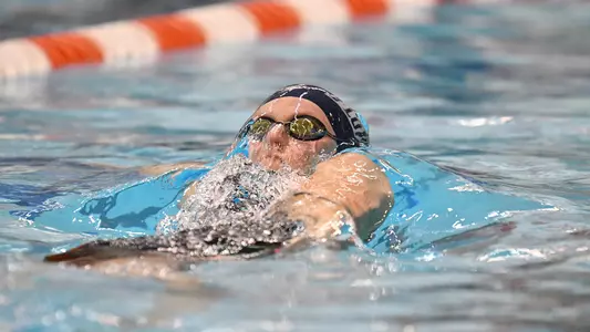 Jacqueline Barklund does the backstroke at the CCSA Championship.