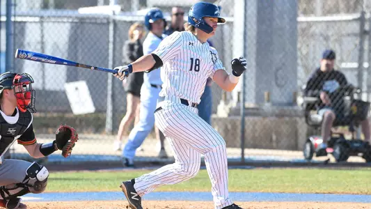 Tanner Clark follows through on swing