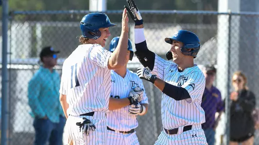 Blake Marabell high-fives Ricky Presno