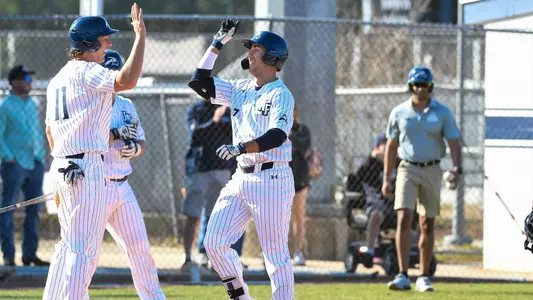 Ricky Presno high fives Blake Marabell